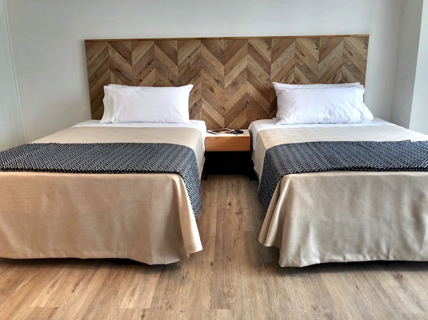 Imagen de la habitación del Hotel RQ Express Antofagasta. Foto 3