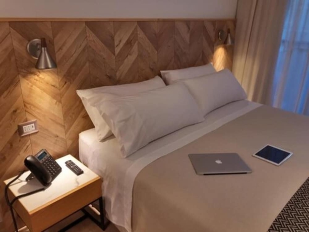 Imagen de la habitación del Hotel RQ Express Antofagasta. Foto 6
