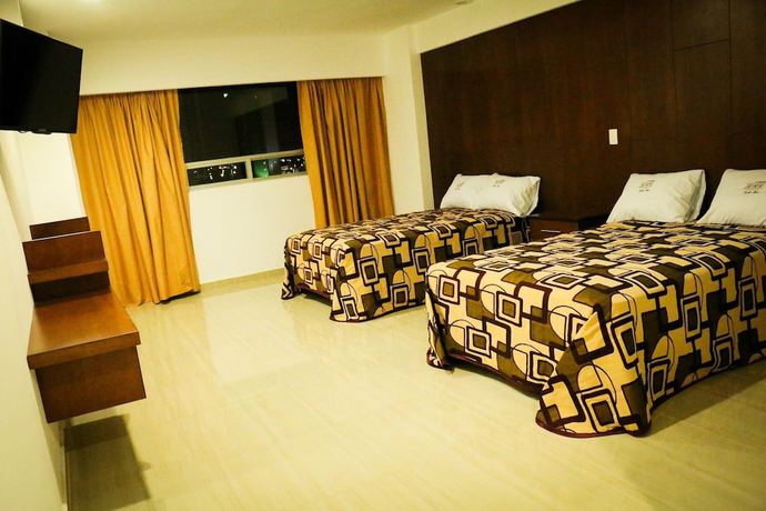 Imagen de la habitación del Hotel RRU Puebla. Foto 7
