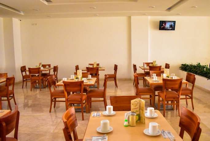 Imagen del bar/restaurante del Hotel RRU Puebla. Foto 4