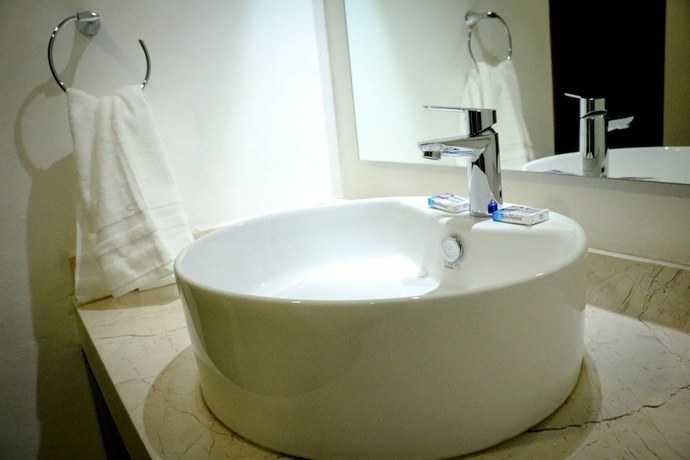 Imagen de la habitación del Hotel RRU Puebla. Foto 10