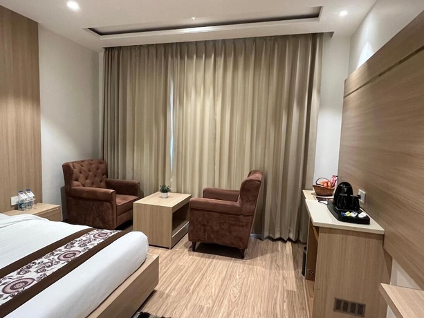 Imagen de la habitación del Hotel RRV with Free Parking. Foto 14