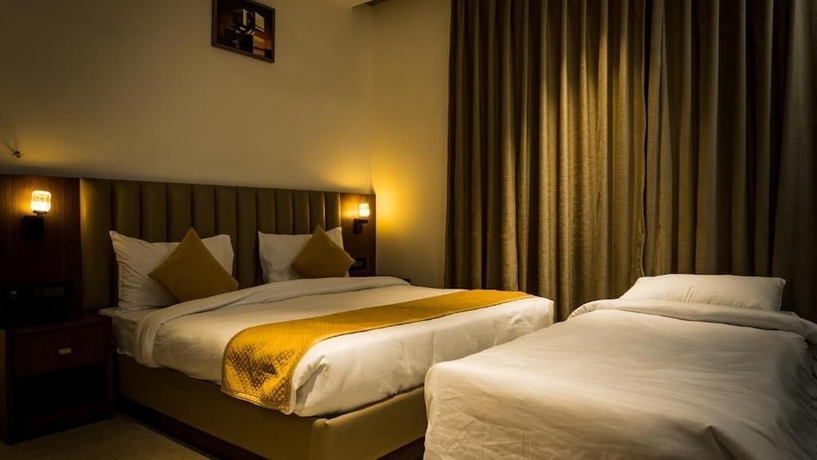Imagen de la habitación del Hotel RS, Agra. Foto 9