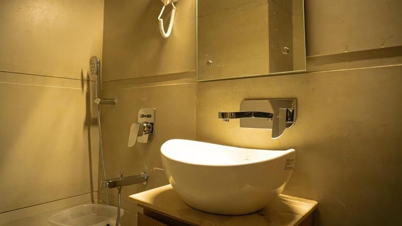 Imagen de la habitación del Hotel RS, Agra. Foto 14