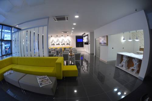 Imagen de la habitación del Hotel RS City. Foto 1