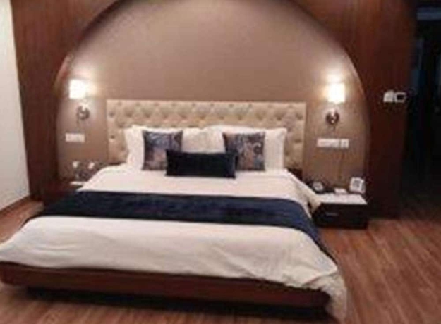 Imagen de la habitación del Hotel RS Sarovar Portico Palampur. Foto 5