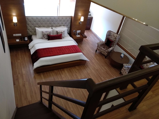 Imagen de la habitación del Hotel RS Sarovar Portico Palampur. Foto 12
