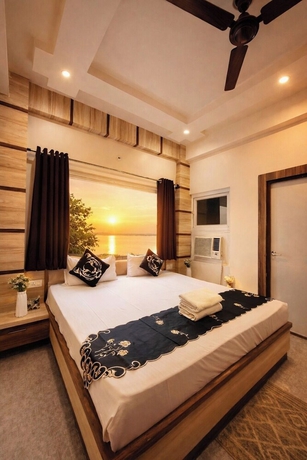 Imagen de la habitación del Hotel RUDRA GANGA HOTEL. Foto 6