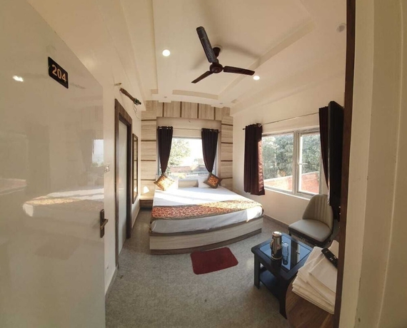 Imagen de la habitación del Hotel RUDRA GANGA HOTEL. Foto 9