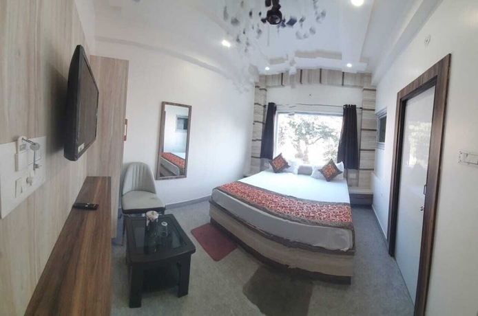 Imagen de la habitación del Hotel RUDRA GANGA HOTEL. Foto 10