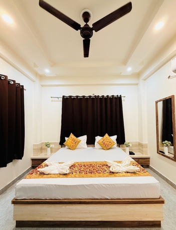 Imagen de la habitación del Hotel RUDRA GANGA HOTEL. Foto 12