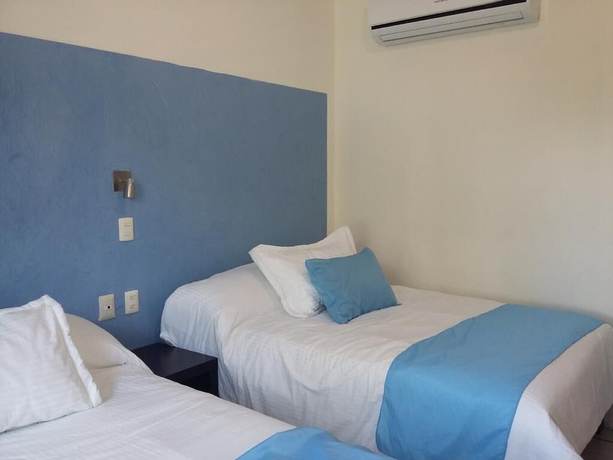 Imagen de la habitación del Hotel RV. Foto 7