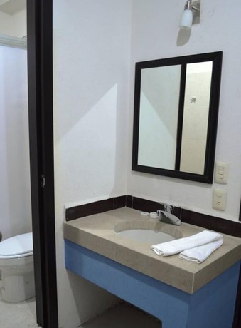 Imagen de la habitación del Hotel RV. Foto 9