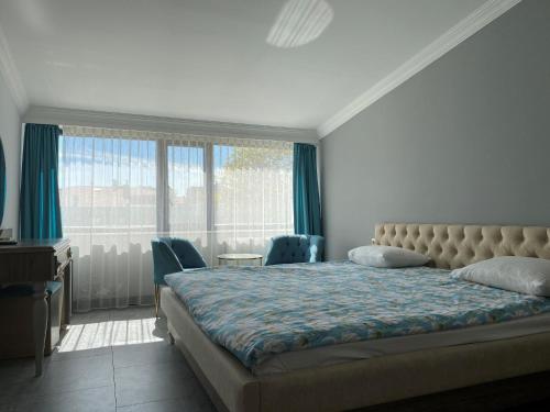 Imagen de la habitación del Hotel RZA HOTEL. Foto 9