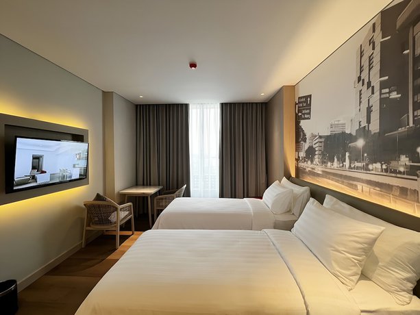 Imagen de la habitación del Hotel Ra Suites Simatupang. Foto 4