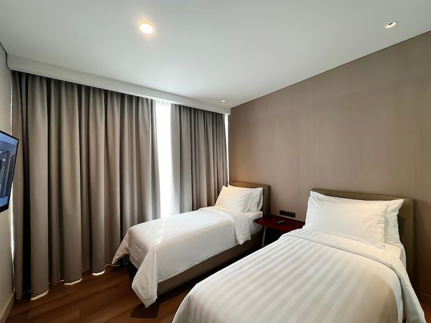 Imagen de la habitación del Hotel Ra Suites Simatupang. Foto 12