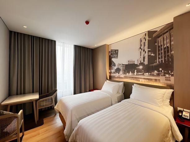 Imagen de la habitación del Hotel Ra Suites Simatupang. Foto 17
