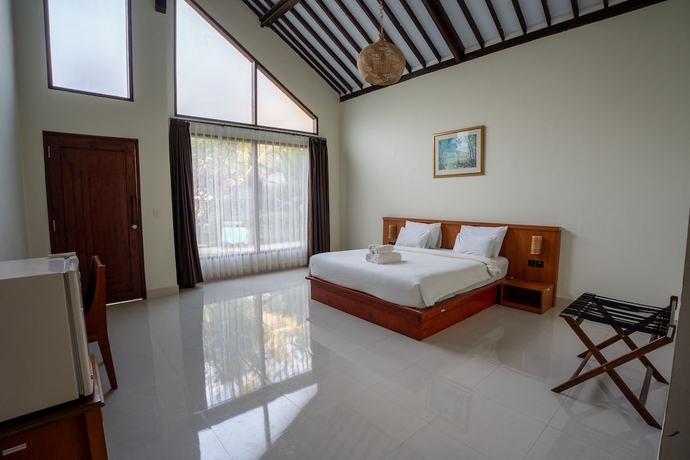 Imagen de la habitación del Hotel RaCottage Mandalika. Foto 6