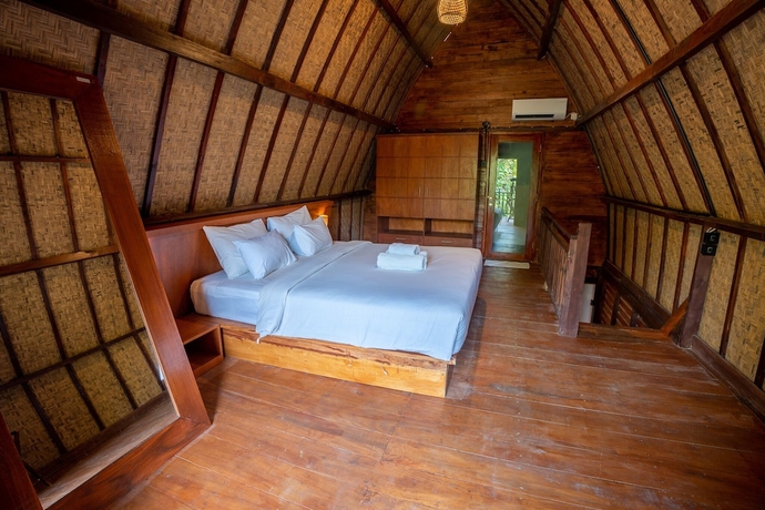 Imagen de la habitación del Hotel RaCottage Mandalika. Foto 14