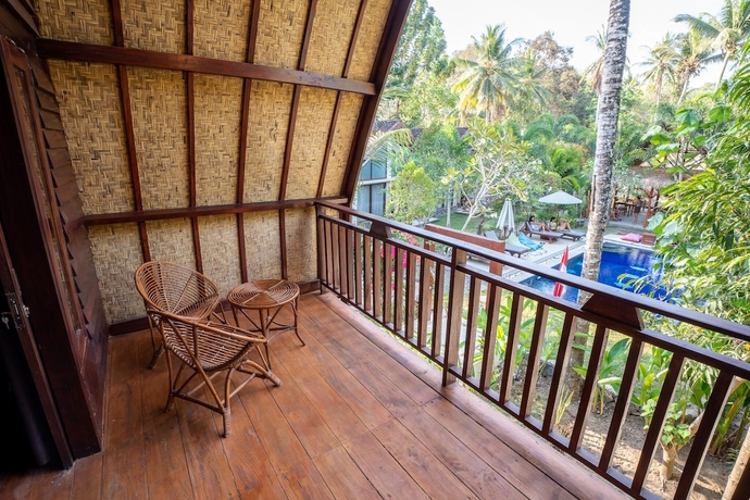 Imagen de la habitación del Hotel RaCottage Mandalika. Foto 17