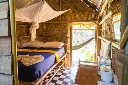 Imagen de la habitación del Hotel Rabbit Bungalow. Foto 3