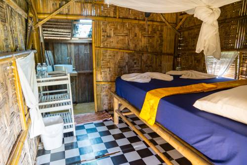 Imagen de la habitación del Hotel Rabbit Bungalow. Foto 4