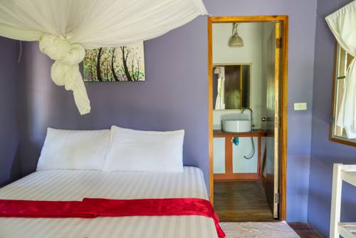 Imagen de la habitación del Hotel Rabbit Bungalow. Foto 7