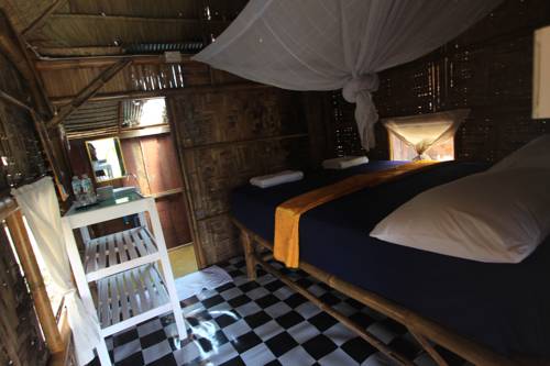 Imagen de la habitación del Hotel Rabbit Bungalow. Foto 13