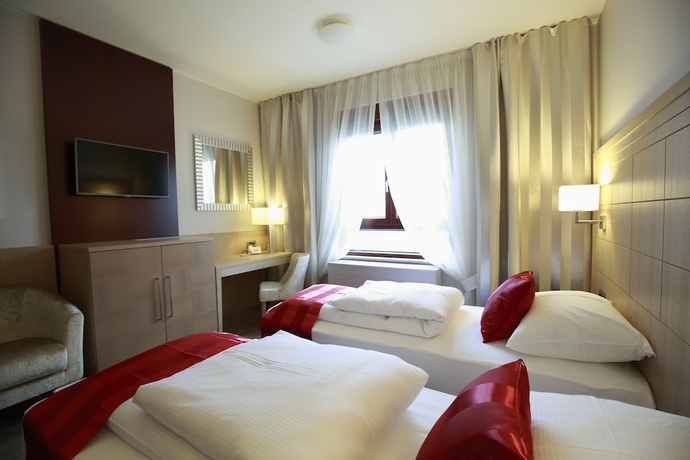 Imagen de la habitación del Hotel Raca. Foto 15