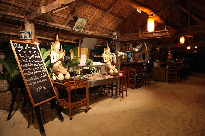 Imagen del bar/restaurante del Hotel Racha Island Resort. Foto 4
