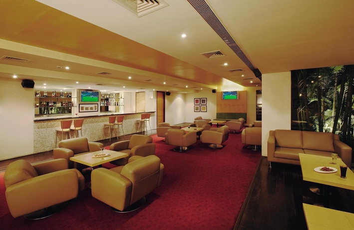 Imagen del bar/restaurante del Hotel Radha Hometel Whitefield. Foto 5