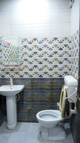Imagen de la habitación del Hotel Radha Krishna Guest House. Foto 13
