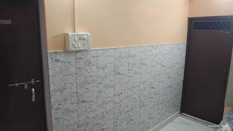 Imagen de la habitación del Hotel Radha Krishna Home. Foto 16