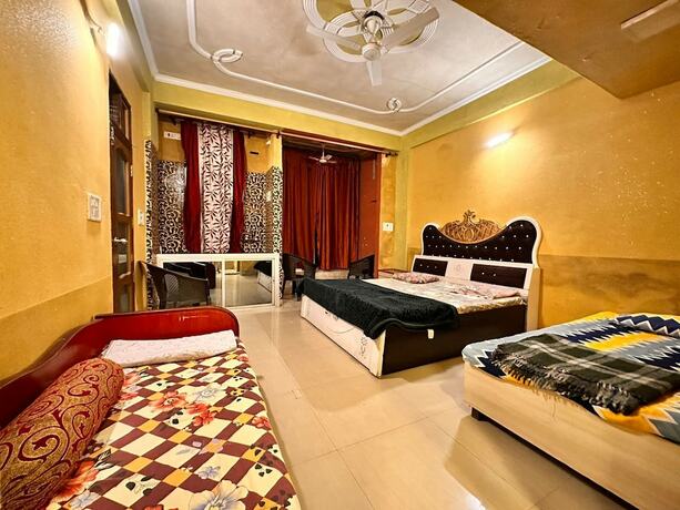 Imagen de la habitación del Hotel Radha Residency. Foto 7
