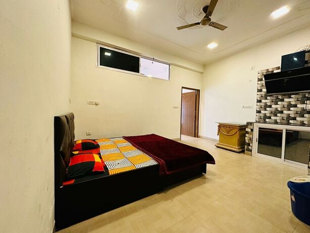 Imagen de la habitación del Hotel Radha Residency. Foto 8