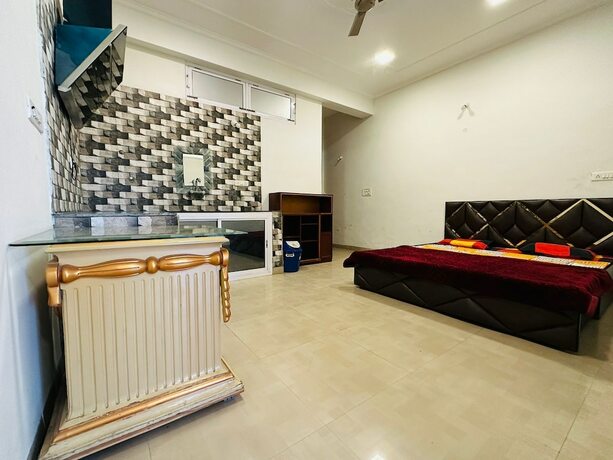 Imagen de la habitación del Hotel Radha Residency. Foto 10