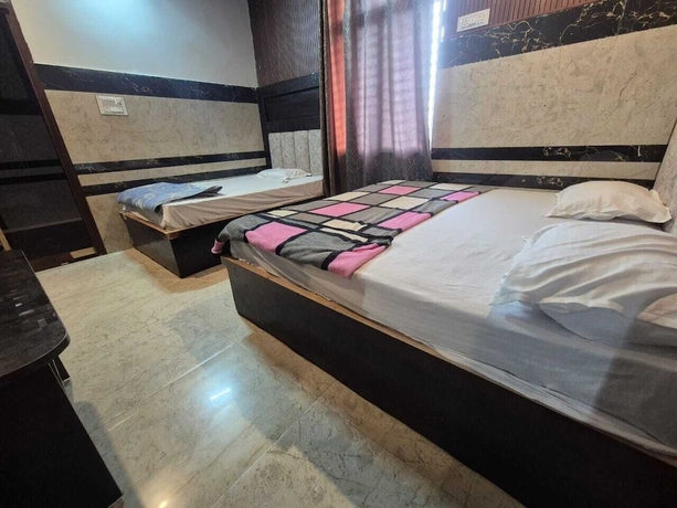 Imagen de la habitación del Hotel Radha rani seva sadan. Foto 11