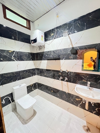 Imagen de la habitación del Hotel Radhe Palace, Faizabad. Foto 4