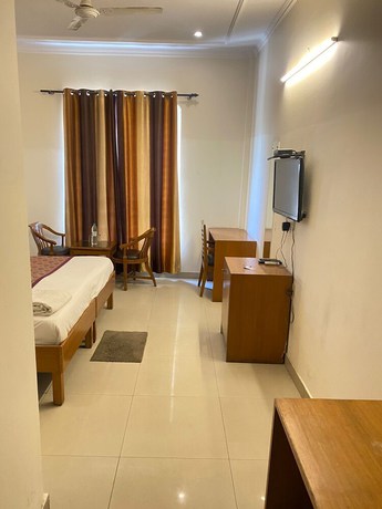 Imagen de la habitación del Hotel Radient Casa. Foto 11