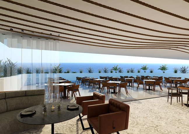 Imagen del bar/restaurante del Hotel Radisson Beach Resort Larnaca. Foto 2