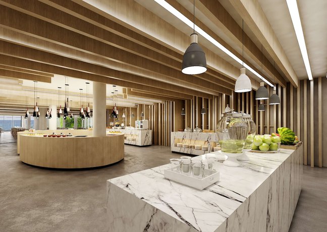 Imagen del bar/restaurante del Hotel Radisson Beach Resort Larnaca. Foto 3