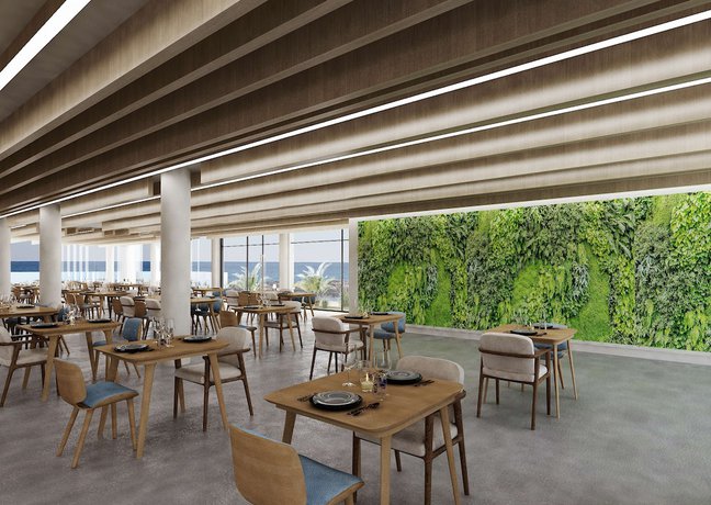 Imagen del bar/restaurante del Hotel Radisson Beach Resort Larnaca. Foto 4