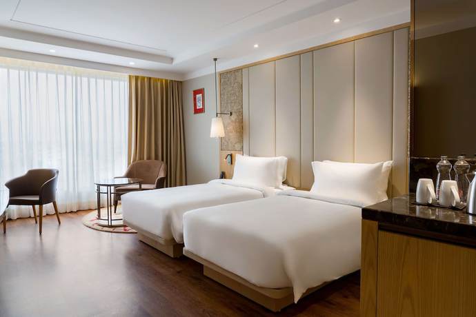 Imagen de la habitación del Hotel Radisson Bhopal. Foto 16