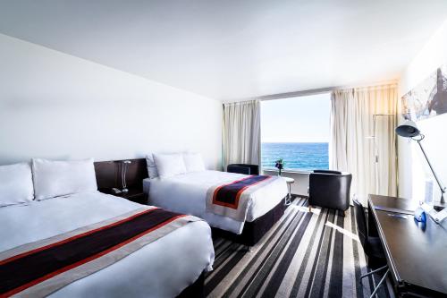 Imagen de la habitación del Hotel Radisson Blu Acqua and Spa Concon. Foto 7