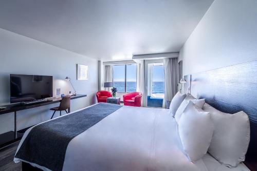 Imagen de la habitación del Hotel Radisson Blu Acqua and Spa Concon. Foto 9