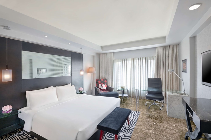 Imagen de la habitación del Hotel Radisson Blu Ahmedabad. Foto 7
