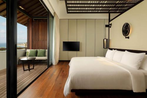Imagen de la habitación del Hotel Radisson Blu Bali Uluwatu. Foto 20