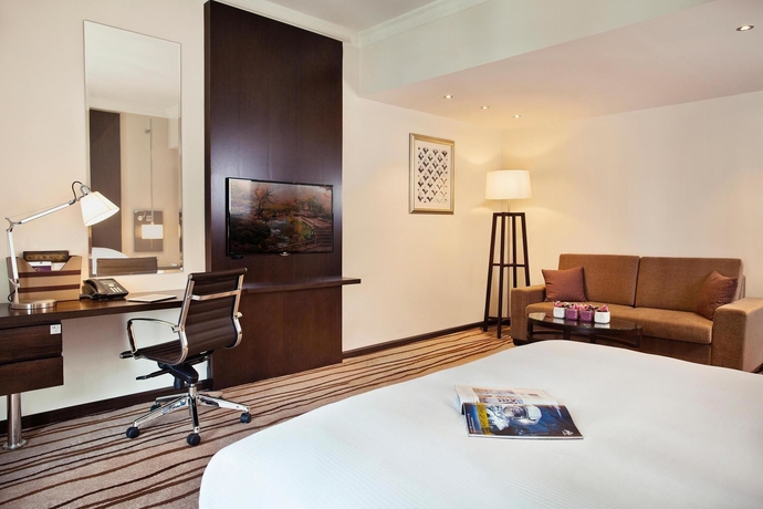 Imagen de la habitación del Hotel Radisson Blu Barsha Heights. Foto 13