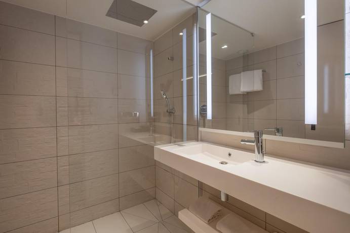 Imagen de la habitación del Hotel Radisson Blu CDG Airport Terminal Hotel, Paris. Foto 11