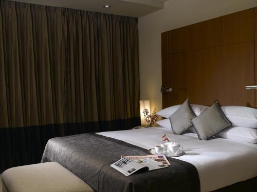 Imagen de la habitación del Hotel Radisson Blu Dhaka Water Garden. Foto 7